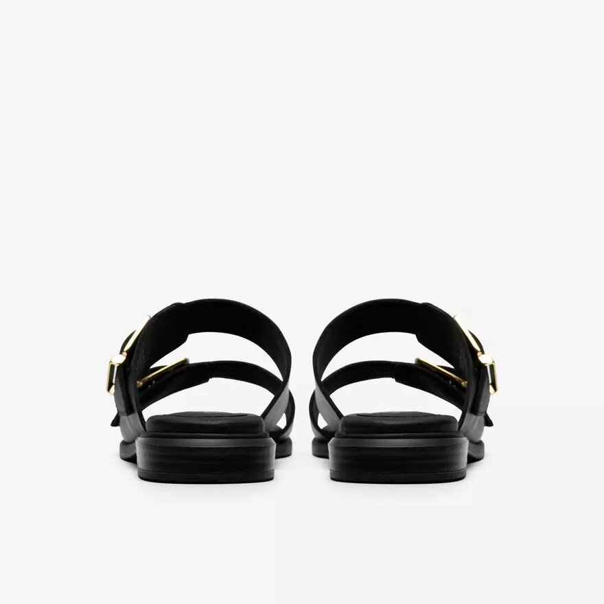 Ariany Bay – flache Sandalen aus schwarzem Leder für Damen Ariany Bay – flache Sandalen aus schwarzem Leder für Damen