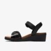Damen-Kacha-Twist-Keilabsatz-Sandaletten aus schwarzem Leder Damen-Kacha-Twist-Keilabsatz-Sandaletten aus schwarzem Leder