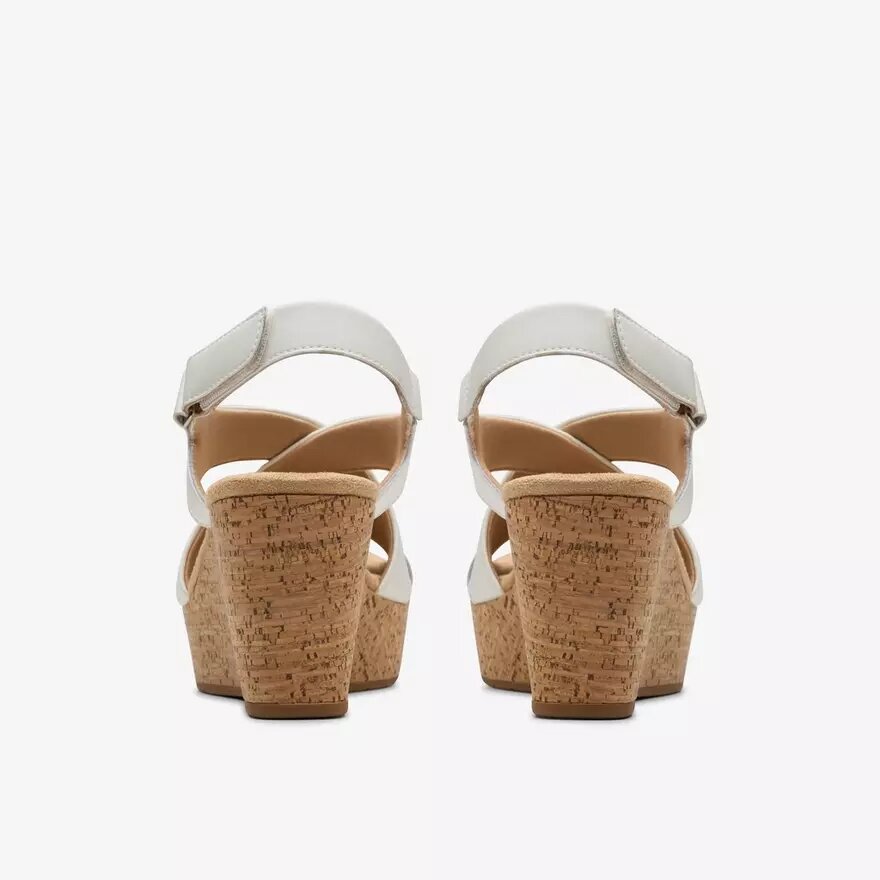 Damen-Keilabsatzschuhe „Rose“ aus weißem Leder Damen-Keilabsatzschuhe „Rose“ aus weißem Leder