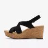 Damen-Keilabsatzschuhe „Rose Style“ aus schwarzem Nubukleder Damen-Keilabsatzschuhe „Rose Style“ aus schwarzem Nubukleder