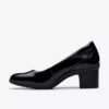 Damen-Pumps „Shaya Poppy“ aus schwarzem Lackleder Damen-Pumps „Shaya Poppy“ aus schwarzem Lackleder
