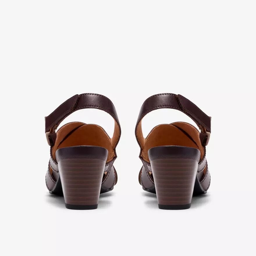 Damen-Sandalen „Kymber Shine“ aus dunkelbraunem Leder mit Absatz Damen-Sandalen „Kymber Shine“ aus dunkelbraunem Leder mit Absatz