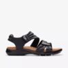 Kitly Ave Flache Sandalen aus schwarzem Leder für Damen Kitly Ave Flache Sandalen aus schwarzem Leder für Damen