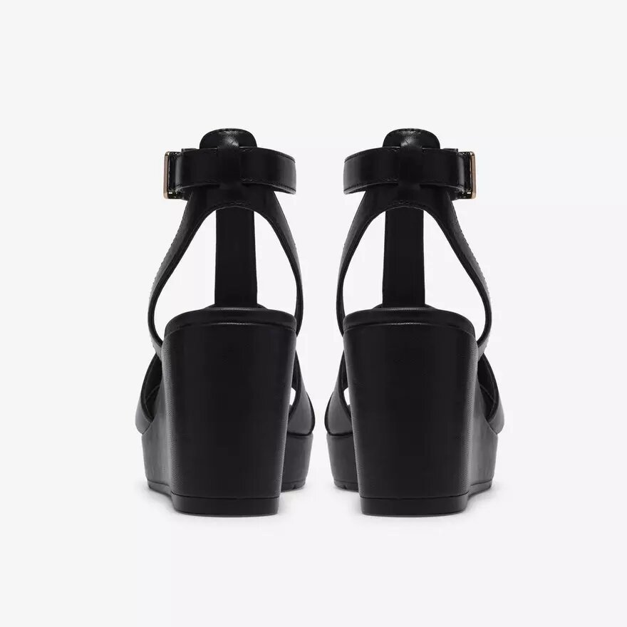 Sabina Hope Keilabsatzschuhe für Damen aus schwarzem Leder Sabina Hope Keilabsatzschuhe für Damen aus schwarzem Leder