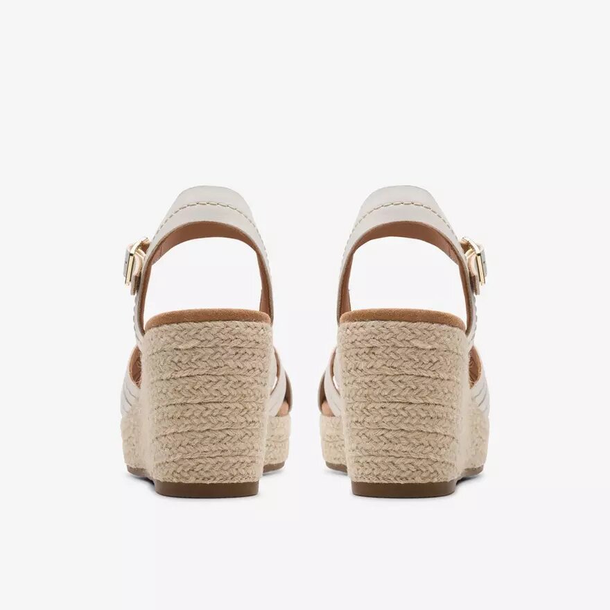 Sabina Strap Keilabsatzschuhe für Damen aus cremefarbenem Leder Sabina Strap Keilabsatzschuhe für Damen aus cremefarbenem Leder