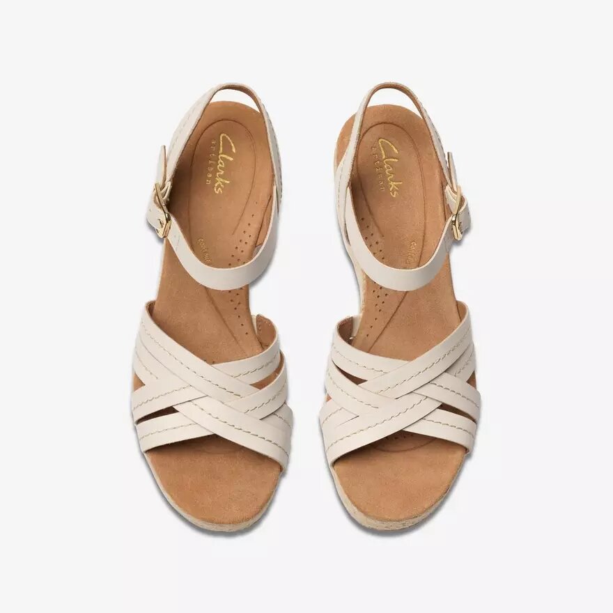 Sabina Strap Keilabsatzschuhe für Damen aus cremefarbenem Leder Sabina Strap Keilabsatzschuhe für Damen aus cremefarbenem Leder